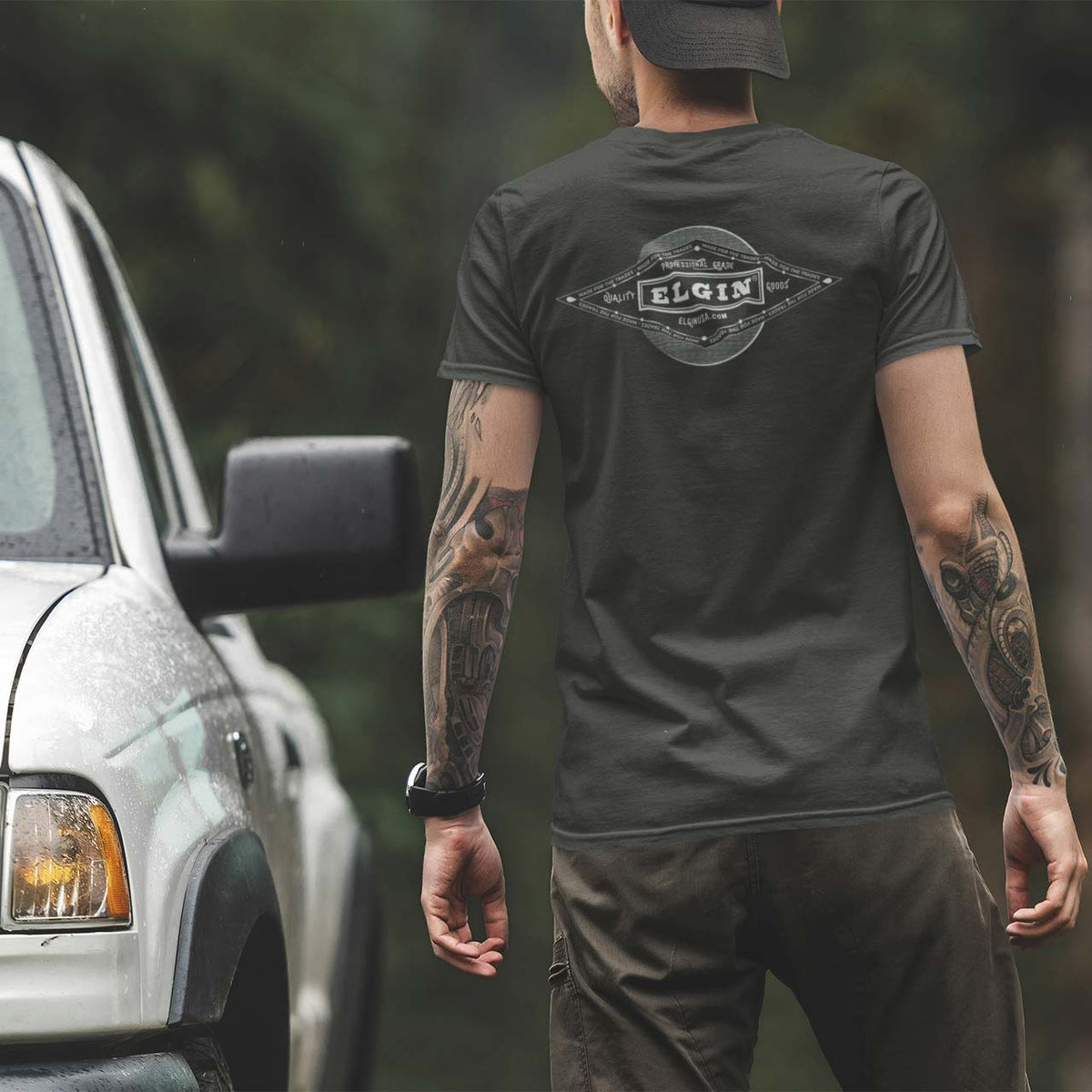Man with tattoos wearing Elgin Vintage Logo T-shirt